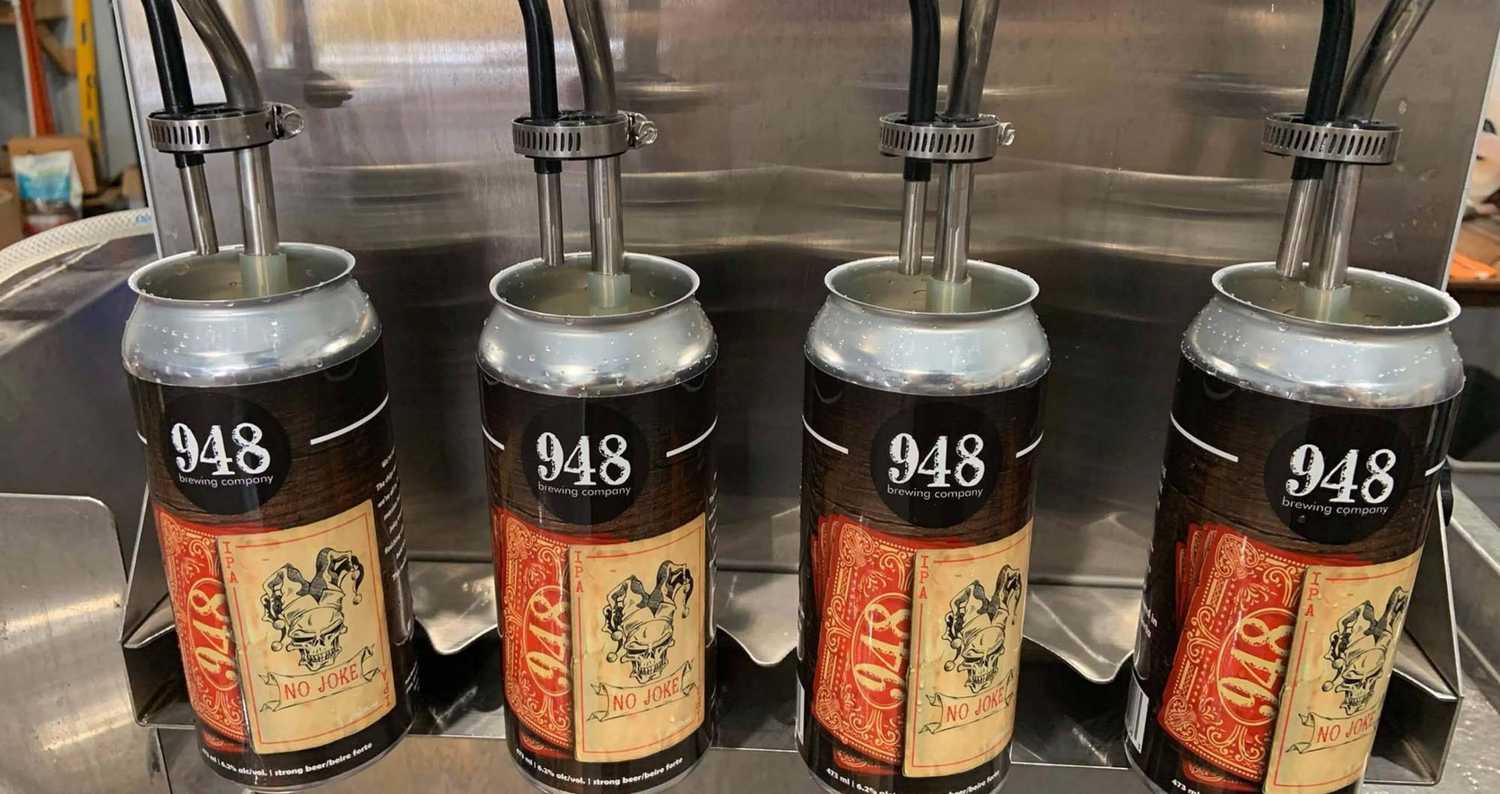 948 Brewing Company beer cans are being Filled..
